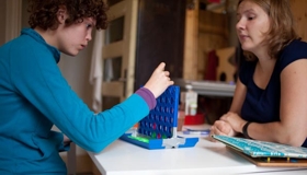 mom working with son